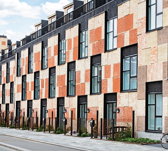 Building facade using reused brickwork